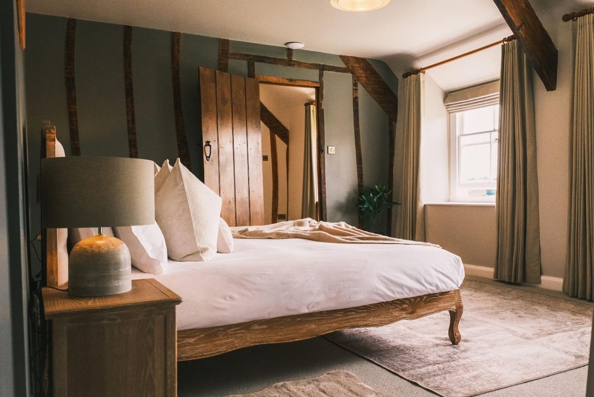 Clean holiday let bedroom prepared for a changeover